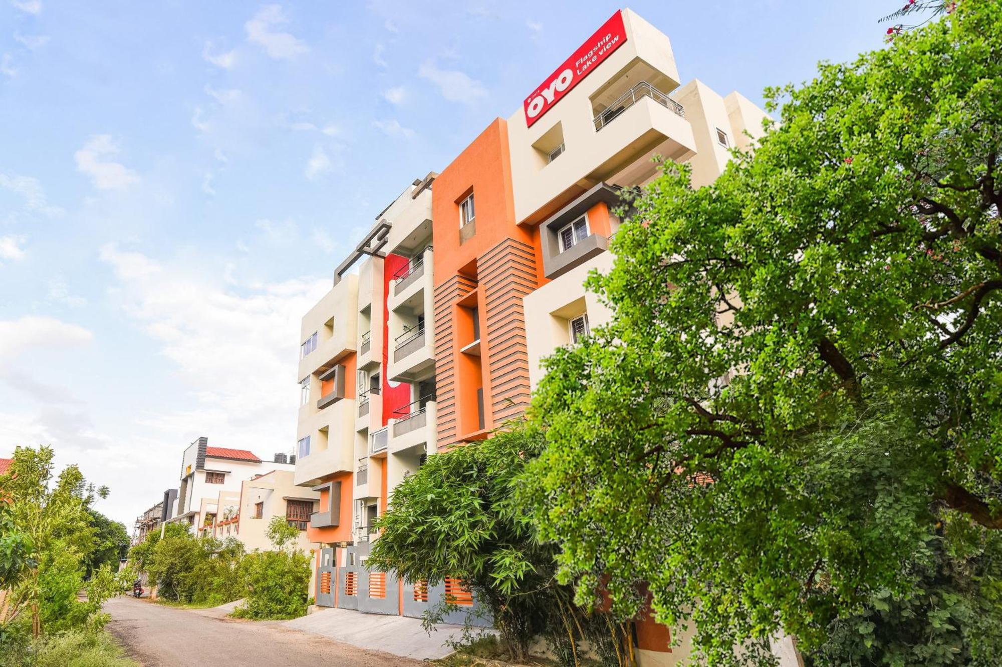 Oyo Flagship Lotus Lakeview Apartments Singānallūr Bagian luar foto